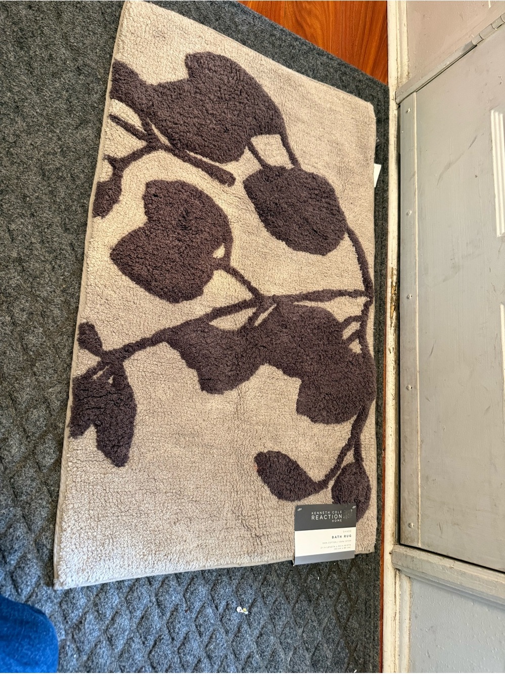 Kenneth Cole Beige Bath Mat with Dark Brown Floral Silhouette